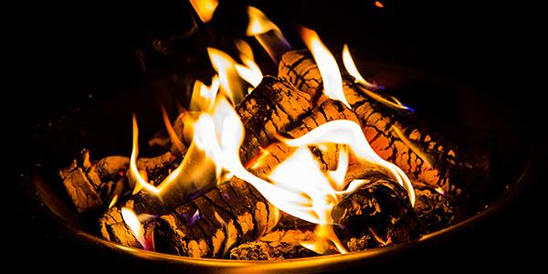 Lit fire pit
