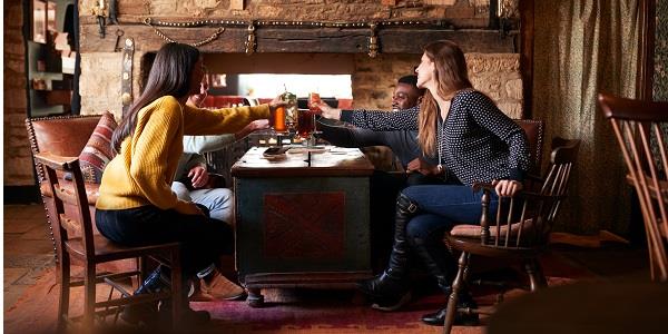 Friends toasting in one of the best pubs in the Forest of Bowland