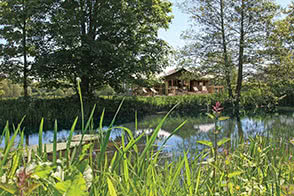 Luxury glamping tents by the ornamental lake