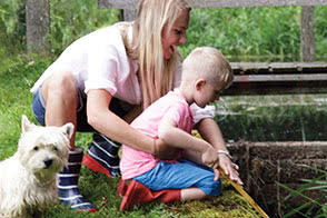 Mum, little boy and a dog enjoying the outdoors - thumbnail