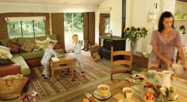 A family on a glamping holiday