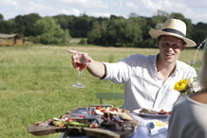 Romantic dinner with wine in the field - thumbnail